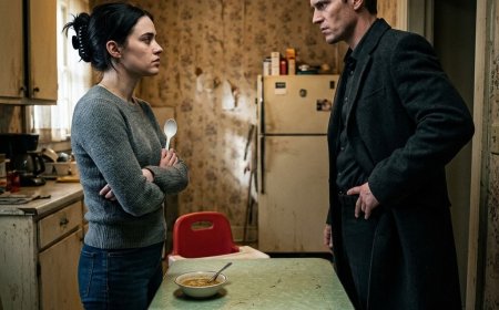 "Put the spoon down," Dominic said, his hand already wrapped around the Sig Sauer in his waistband. He'd walked into his parents' kitchen expecting a hitman — but found a 26-year-old woman in a faded sweatshirt patiently wiping marinara off his dying father's chin. She didn't flinch at his voice. She didn't run. She just shifted her body between him and a little boy coloring at the table. Then she looked him dead in the eye and said four words that stopped him cold: "You're the son." And what Dominic discovered about her that night would change everything he thought he knew about loyalty, protection, and the true cost of power.