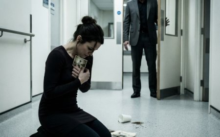 "I don't know who she was," Dela whispered, her hands still bleeding from the shattered glass as the ambulance sirens grew closer. She had just pulled a young woman from a burning car, never asking for a name or a reward. But three days later, when a man in a black suit appeared at her crumbling boarding house with a check that could change everything, she realized the stranger she saved had a brother — and that brother owned the empire that murdered her father.
