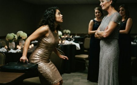 "Table 23, lower level," Margaret said, directing Zara to the overflow seating at her sister's wedding. She sat alone with a cold coffee and her laptop, working on estate documents while 214 guests celebrated upstairs. Then a stranger in a dark suit found her in the basement, sat down opposite her, and said exactly one thing about the music playing above them — and in that moment, Zara realized he was the only person all night who had noticed she was missing.