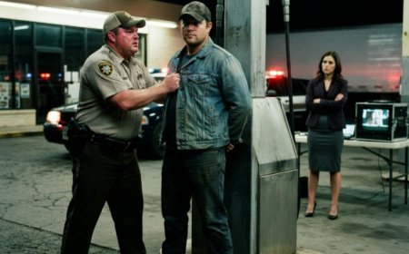 "Empty trailer, officer," the tired trucker said, keeping his eyes on the fuel pump. Two deputies saw easy prey that night — a lone driver, a cracked taillight they could invent, a lockbox they could break open. But when Deputy Reed pried the steel lid off with a crowbar and reached inside, he didn't find cash or drugs. He found a federal badge, his own name on a stack of indictments — and a man who had just stopped pretending to be afraid. Then the entire town of Ridgefield woke up to find their police force had vanished overnight.