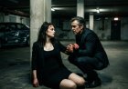 "Don't trust him," she whispered, her fingers locked around his wrist with a strength that made no sense for a woman barely breathing. Damian Valente had spent 15 years trusting the man beside him with everything — his empire, his secrets, his father's death. Then a dying administrative assistant handed him a stained envelope and said six words that turned 19 years of loyalty into a lie. The man who saved his life was the one who'd been killing everyone else... and the proof was hidden inside her apartment behind a bathroom mirror.