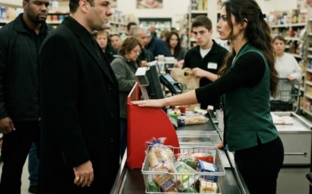 "Remove that," the bodyguard said, his hand already on the basket. Rachel looked at the red divider in her hand — then placed it sideways in front of his groceries. The whole store went quiet. She told him exactly where the line began. Then Vincent Marchetti walked toward register four, and for the first time in his life, a cashier made the most dangerous man in the room start over from the back.