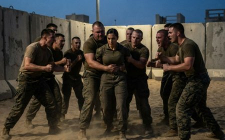 "Finish her off," the Gunnery Sergeant ordered from the edge of the arena as 12 Marines closed in around me. I'd been training for six days, and they'd spent every one of them trying to break me. But when the circle tightened and the first punch came, I didn't flinch. Then three men grabbed my arms at once, and the Gunnery Sergeant screamed it again — "Finish her off!" — and I made a decision that would change everything about the Marine Corps forever.