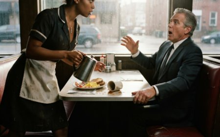 "She wore it every single shift, tucked beneath her collar where no one could see," the waitress said, setting down the coffee pot. The CEO froze mid-sip. Twenty-six Monday mornings. Twenty-six cups of coffee. Three feet apart for six months. Then her collar shifted, a silver bird caught the morning light, and the man who'd been searching for twenty-one years finally saw what had been right in front of him the whole time.