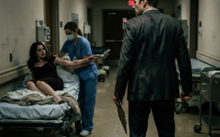 "Prioritize Khloe," my husband told the ER doctor, his eyes fixed on the other woman's door as I bled out on a gurney behind him. I signed my own surgical consent form with blood on my fingers. Then I removed my wedding ring on the operating table, made one phone call from my hospital bed, and by the time he remembered I existed — I was already on a plane to another country, with a divorce attorney on speed dial and a medical file that would destroy everything he thought he knew.