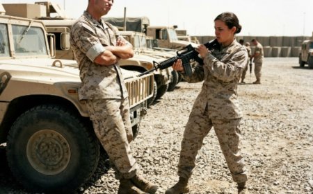 "The firing pin's damaged," Emma said, holding up the broken rifle Wade had just handed her. He just smiled and turned away. The convoy was rolling out in 15 minutes, and she was a medic with a weapon that couldn't fire. Then the RPG hit the lead vehicle, and the valley exploded into chaos. And as bullets rained down from the hills, Emma Reyes did something no one expected — something that would reveal a secret she'd buried for seven years.