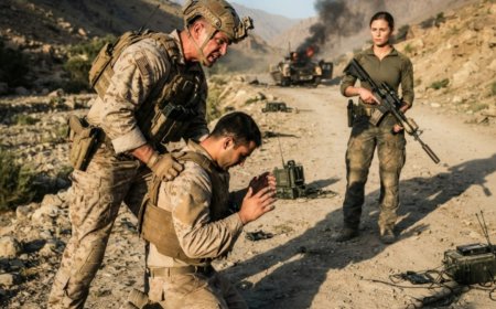 "Your colonel lied to me," the enemy warlord screamed into the radio as his own men started falling to a shooter nobody could see. Commander Walker had already accepted the number zero — 11 men, 4 minutes of ammunition, no rescue coming. Then a Marine sergeant who'd been ordered to stay 9 miles away keyed a microphone from a ledge everyone said was impossible. She'd been up there for 4 hours before they even landed. And when she told them exactly where the ambush was coming from, Walker's entire world turned upside down — because she wasn't just saving their lives. She was about to expose something that 41 people in a briefing tent had laughed at 14 hours earlier... and one colonel would kill to keep buried.