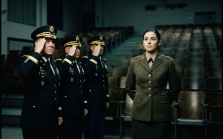 "She had blood on her face and every eye in that marble hall watching her," the woman who everyone thought was just a struggling scholarship cadet told herself. She didn't cry. She didn't curse. She just stood up and kept climbing the stairs. Then she won an impossible exercise by reading the manual that nobody else bothered to read. But when three generals walked into the room and called her "Major," the entire academy realized they'd been looking at a decorated officer the whole time... and the man who'd shoved her down was about to answer for it.